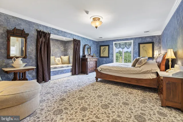 a view of a swimming pool with a yard