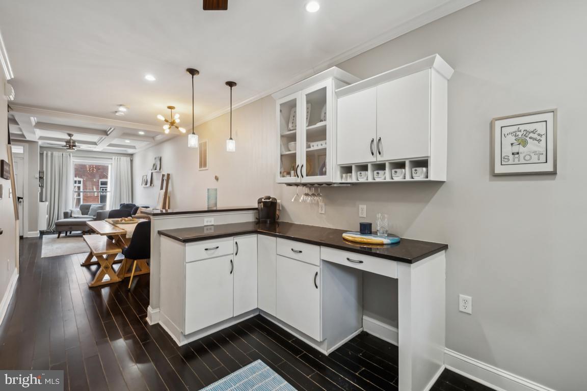 121 South Curley Street Baltimore, MD 21224 - Photo 19 of 40 Modern kitchen with sleek cabinetry.