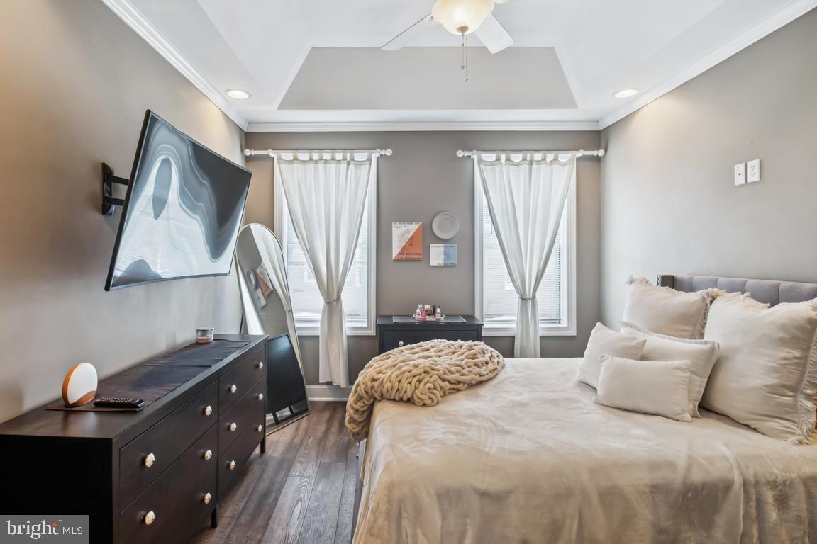 121 South Curley Street Baltimore, MD 21224 - Photo 29 of 40 Serene bedroom with modern elegance.