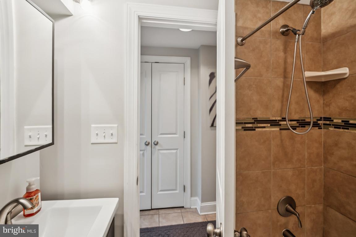 121 South Curley Street Baltimore, MD 21224 - Photo 35 of 40 Modern bathroom with stylish tile accents.