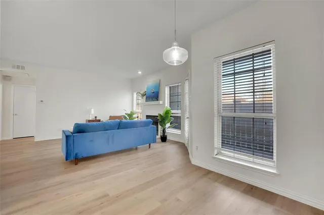a view of room with furniture and a window