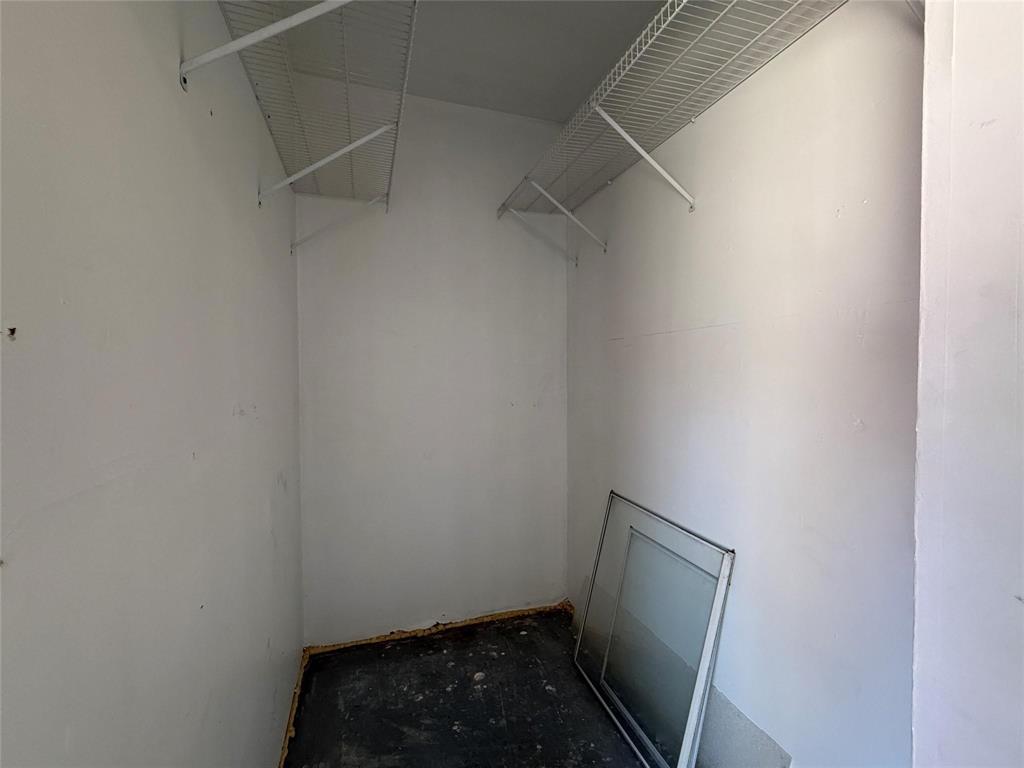 1700 Amelia Court, Unit 312 Plano, TX 75075 - Photo 24 of 30 a small space with wooden floor and a window