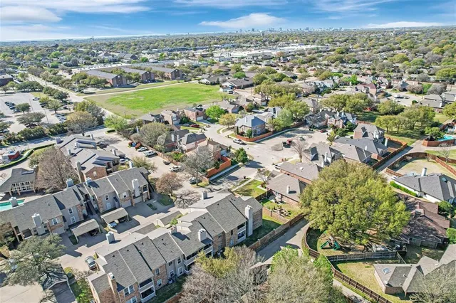 an aerial view of a house with a outdoor space