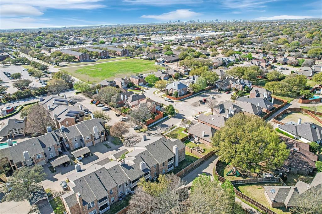 1700 Amelia Court, Unit 312 Plano, TX 75075 - Photo 5 of 30 an aerial view of a house with a outdoor space
