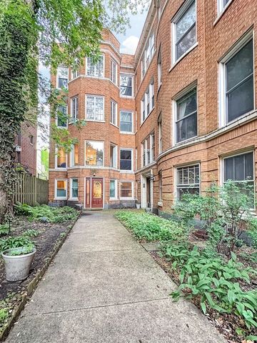 a view of a building with a garden