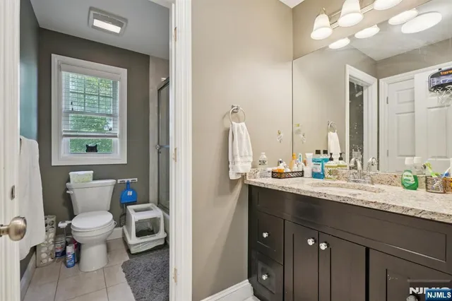 a view of bathroom with a sink and a toilet