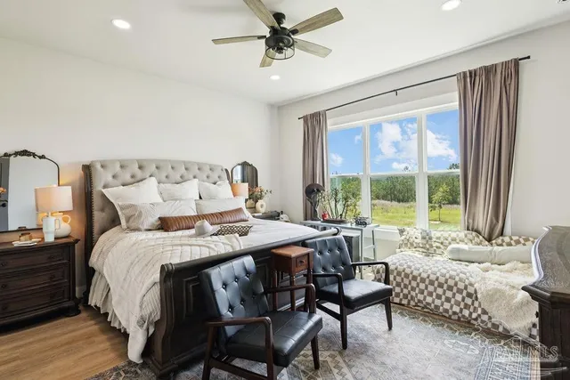 a bed room with a bed and a couch