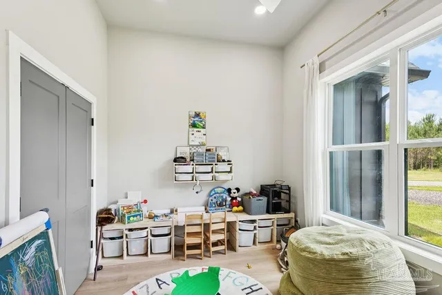 a living room with furniture and a table
