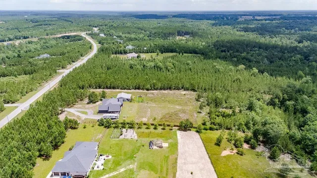a view of a golf course with a lake