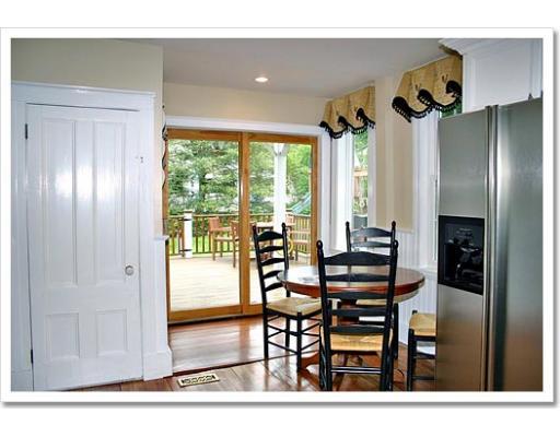 13 Short Street Cohasset, MA 02025 - Photo 11 of 20 a view of a dining room with furniture window and wooden floor