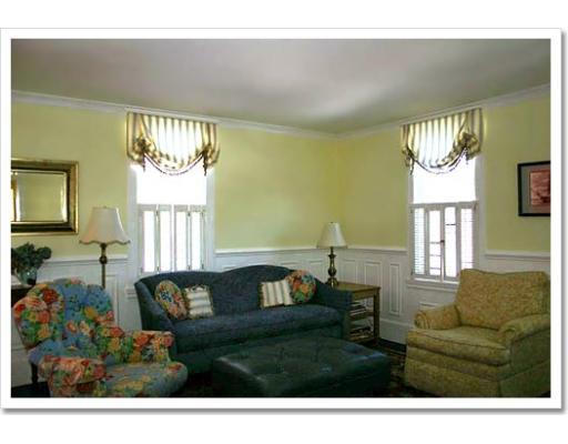 13 Short Street Cohasset, MA 02025 - Photo 13 of 20 a living room with furniture and a large window