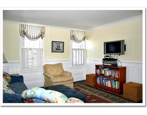 13 Short Street Cohasset, MA 02025 - Photo 14 of 20 a living room with furniture and a flat screen tv