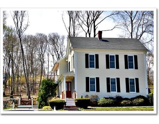 13 Short Street Cohasset, MA 02025 - Photo 2 of 20 a front view of a house with a yard