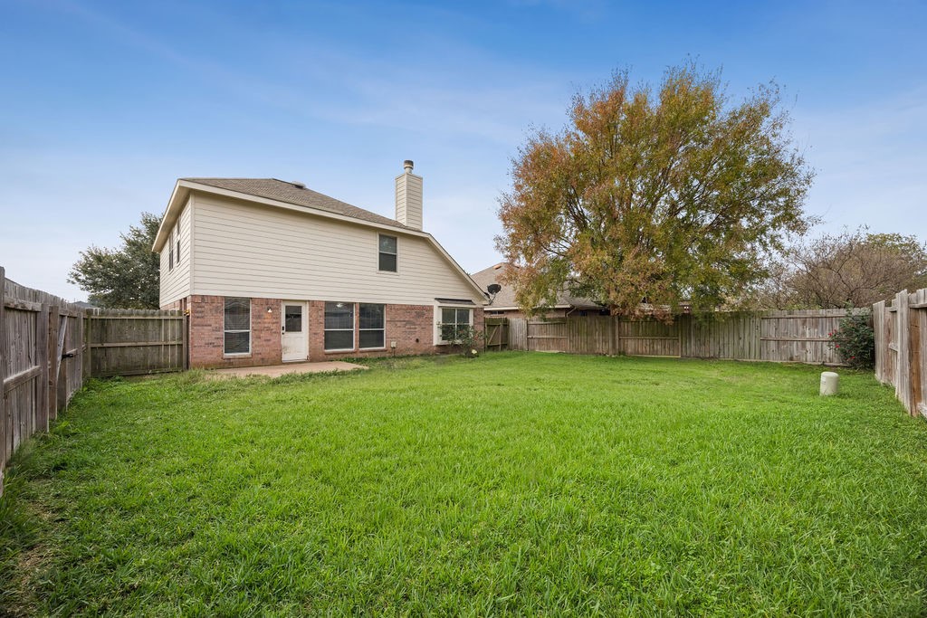 19731 Village Ridge Drive Tomball, TX 77375 - Photo 20 of 23 a view of a house with backyard