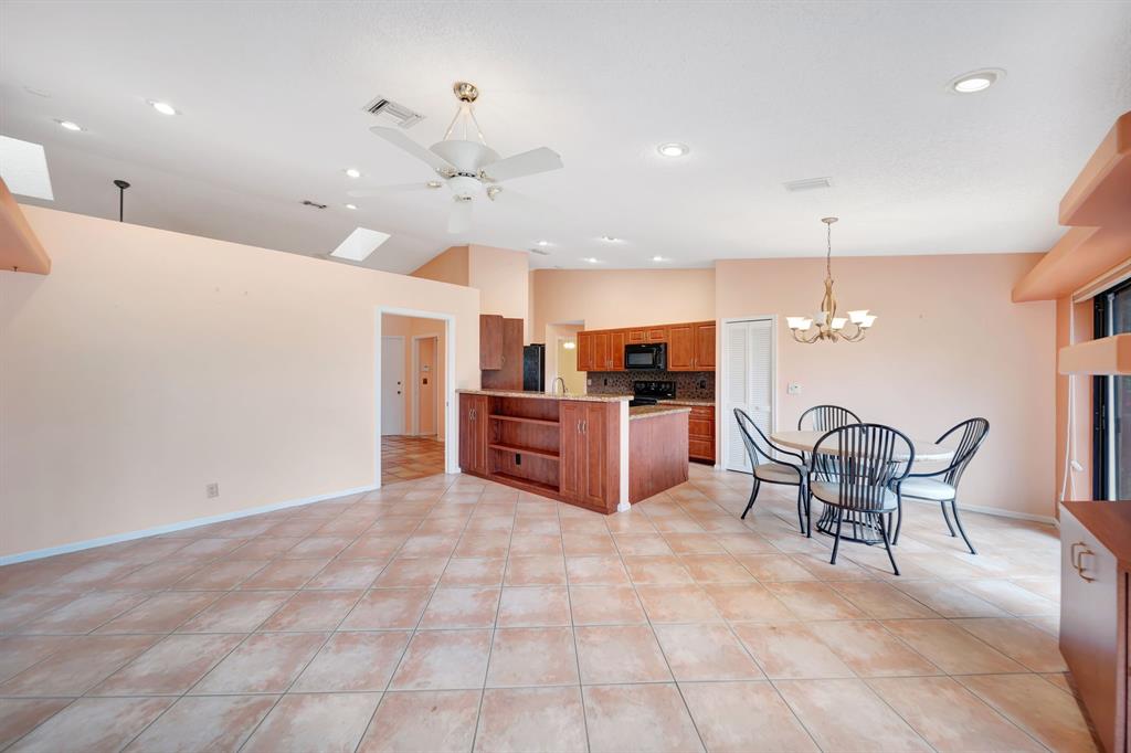8507 Northwest 83rd Street Tamarac, FL 33321 - Photo 11 of 45 Family Room & Open Kitchen