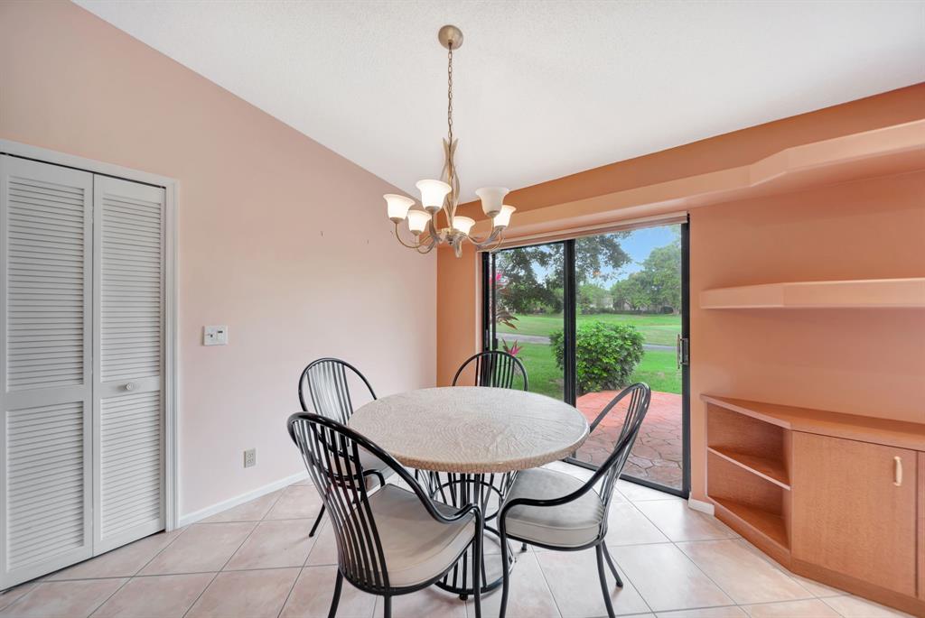 8507 Northwest 83rd Street Tamarac, FL 33321 - Photo 12 of 45 Dinette Area Off Kitchen & Louvered Doors To Pantry