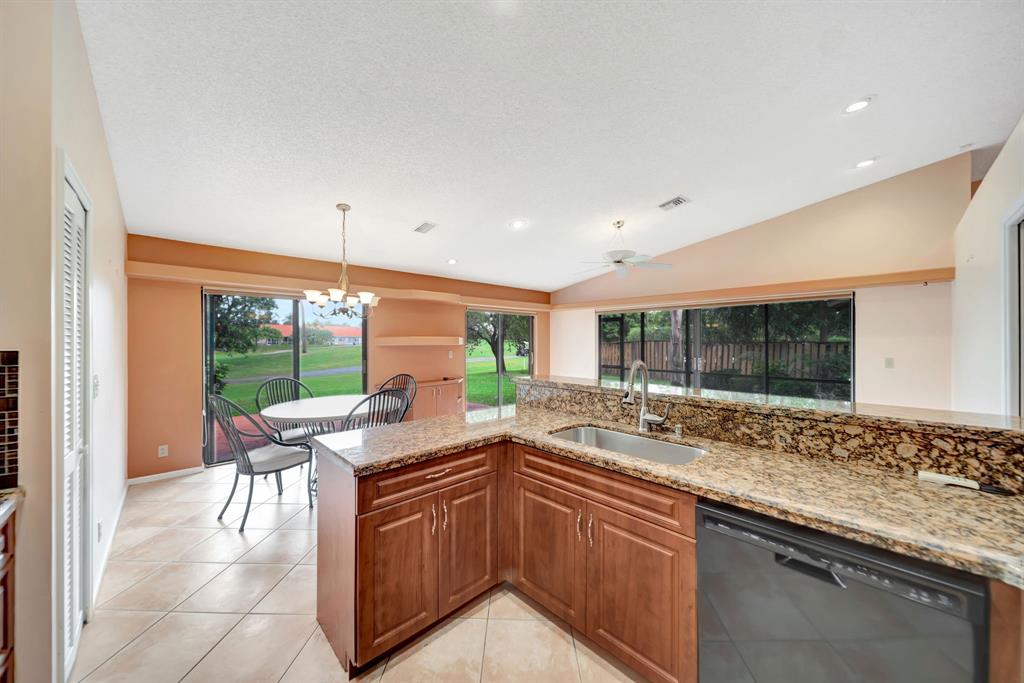 8507 Northwest 83rd Street Tamarac, FL 33321 - Photo 16 of 45 Open Kitchen With Beautiful Golf Course Views