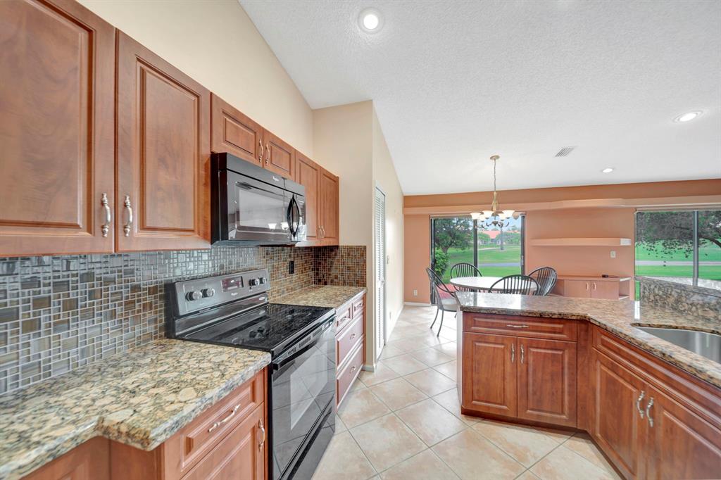 8507 Northwest 83rd Street Tamarac, FL 33321 - Photo 17 of 45 Open Kitchen