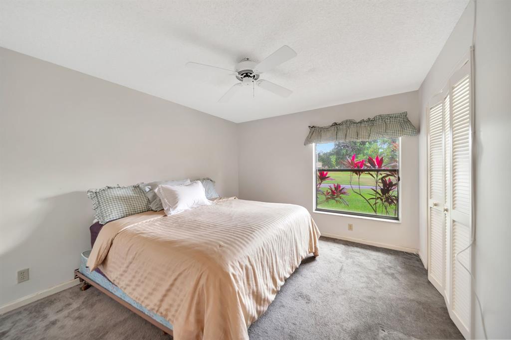 8507 Northwest 83rd Street Tamarac, FL 33321 - Photo 22 of 45 Guest Bedroom With Golf Course View