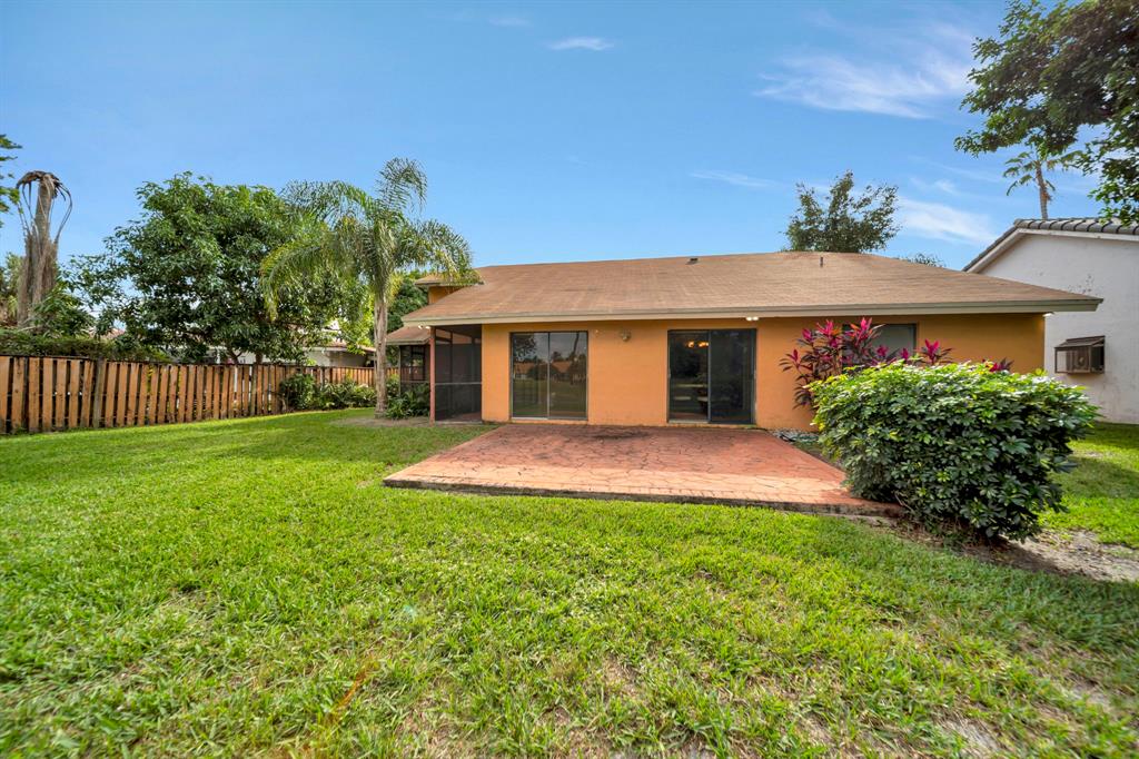 8507 Northwest 83rd Street Tamarac, FL 33321 - Photo 39 of 45 Rear View of Home & Patio