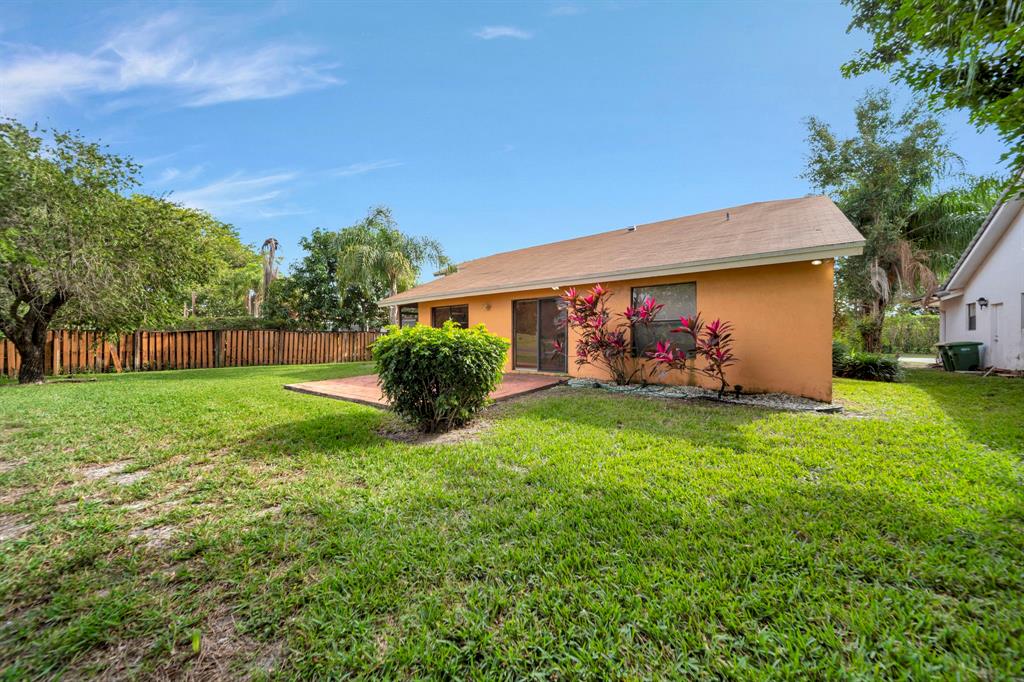 8507 Northwest 83rd Street Tamarac, FL 33321 - Photo 40 of 45 Backyard on 8000+ Square Foot Lot
