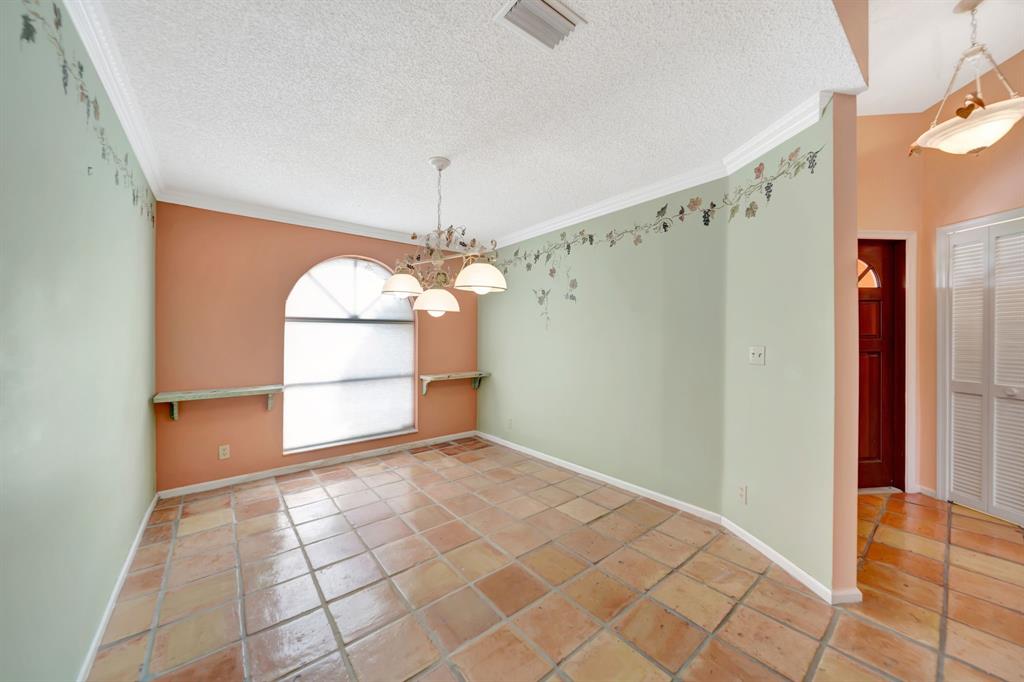8507 Northwest 83rd Street Tamarac, FL 33321 - Photo 8 of 45 Dining Room With Large Window & Ample Natural Light