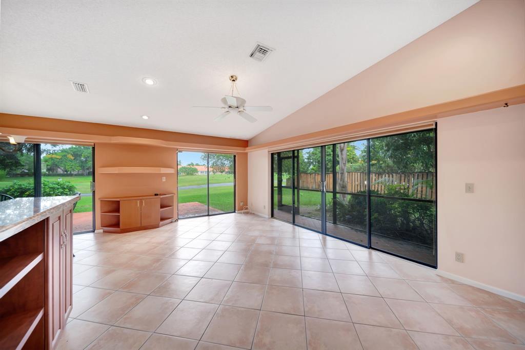 8507 Northwest 83rd Street Tamarac, FL 33321 - Photo 9 of 45 Lovely Family Room With Gorgeous Golf Course Views