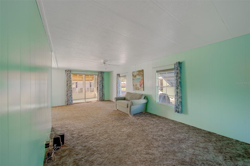 12501 Ulmerton Road, Unit 128 Largo, FL 33774 - Photo 11 of 71 a view of an empty room with a window