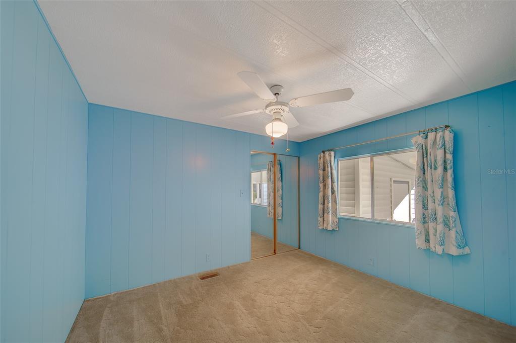 12501 Ulmerton Road, Unit 128 Largo, FL 33774 - Photo 20 of 71 a view of an empty room with a window