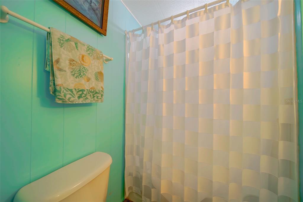 12501 Ulmerton Road, Unit 128 Largo, FL 33774 - Photo 34 of 71 a bathroom with a toilet and a sink