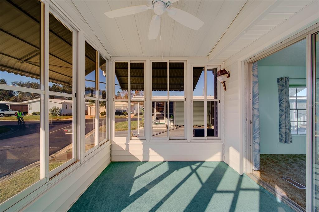 12501 Ulmerton Road, Unit 128 Largo, FL 33774 - Photo 36 of 71 a view of a patio with table and chairs
