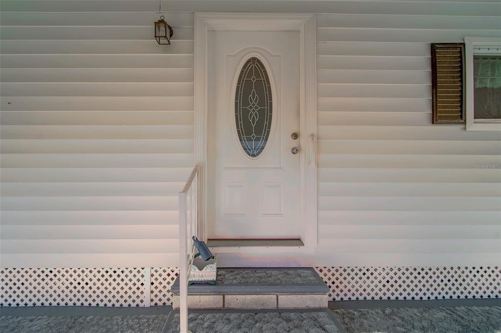 12501 Ulmerton Road, Unit 128 Largo, FL 33774 - Photo 39 of 71 a view of entryway with a wooden floor