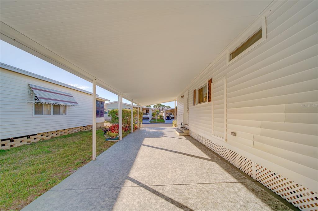 12501 Ulmerton Road, Unit 128 Largo, FL 33774 - Photo 41 of 71 a view of a house with a back yard