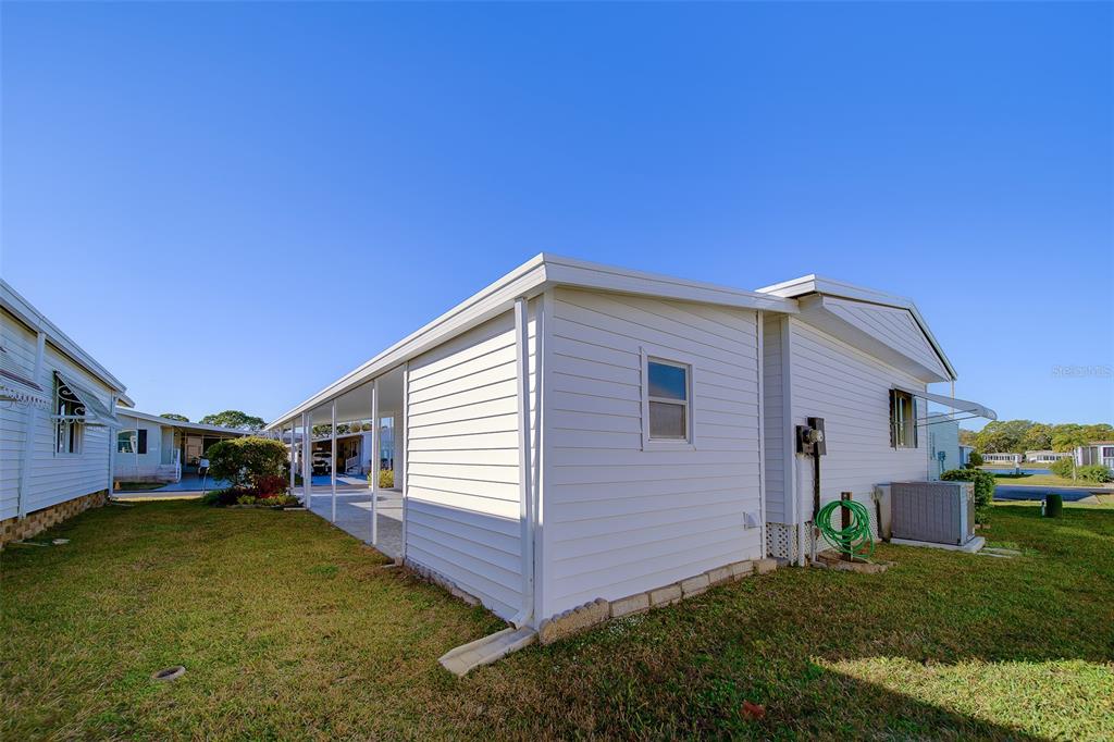12501 Ulmerton Road, Unit 128 Largo, FL 33774 - Photo 51 of 71 a view of a backyard with a garden