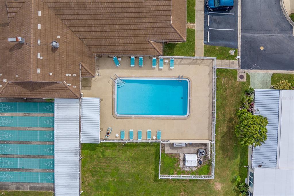 12501 Ulmerton Road, Unit 128 Largo, FL 33774 - Photo 61 of 71 a view of a brick wall of a building with a yard