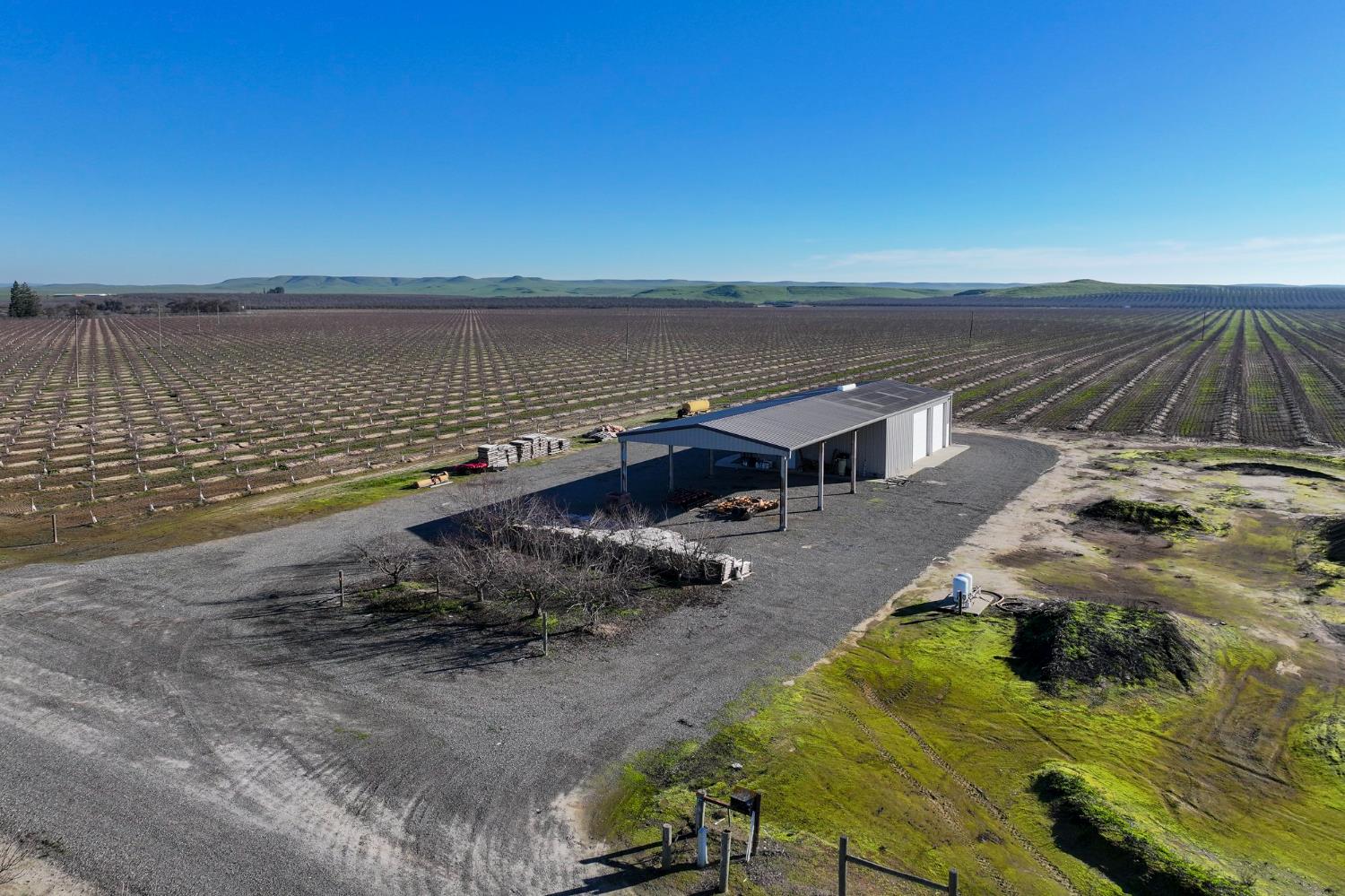 15116 Allen Road Snelling, CA 95369 - Photo 8 of 12 an aerial view of a house with a lake