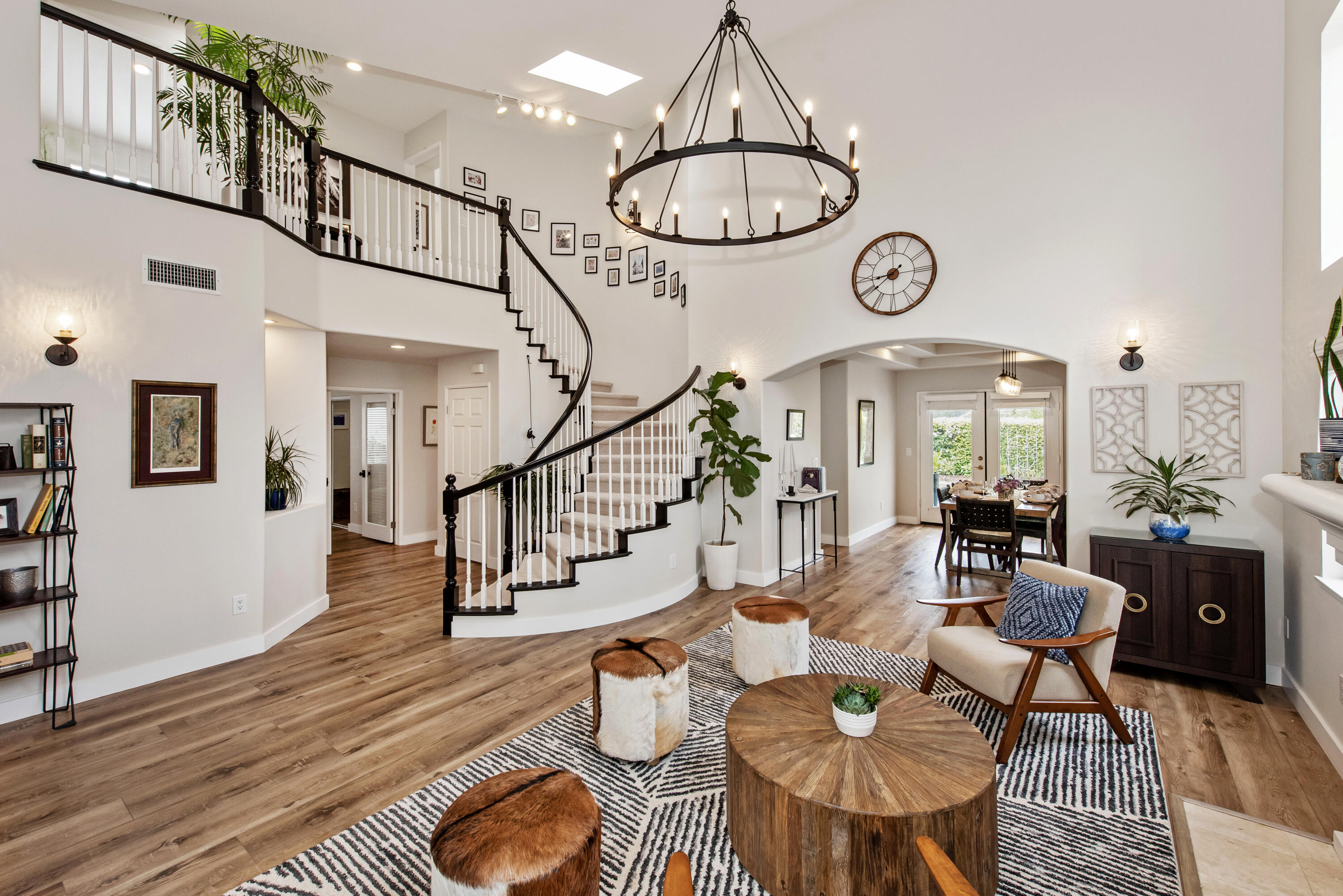 7906 Winchester Circle Goleta, CA 93117 - Photo 1 of 26 a view of dining room and hall with wooden floor