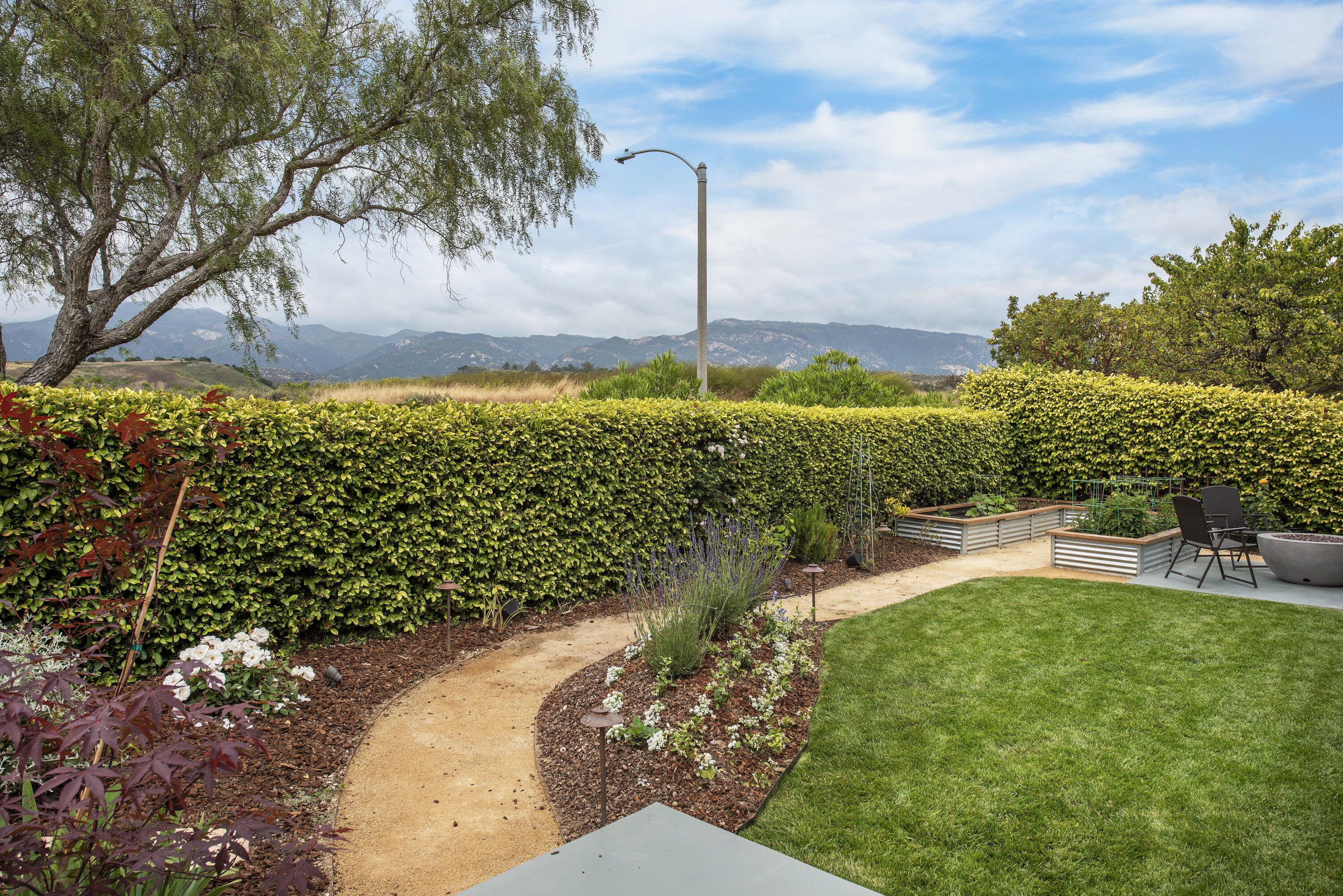 7906 Winchester Circle Goleta, CA 93117 - Photo 22 of 26 a view of a back yard of the house