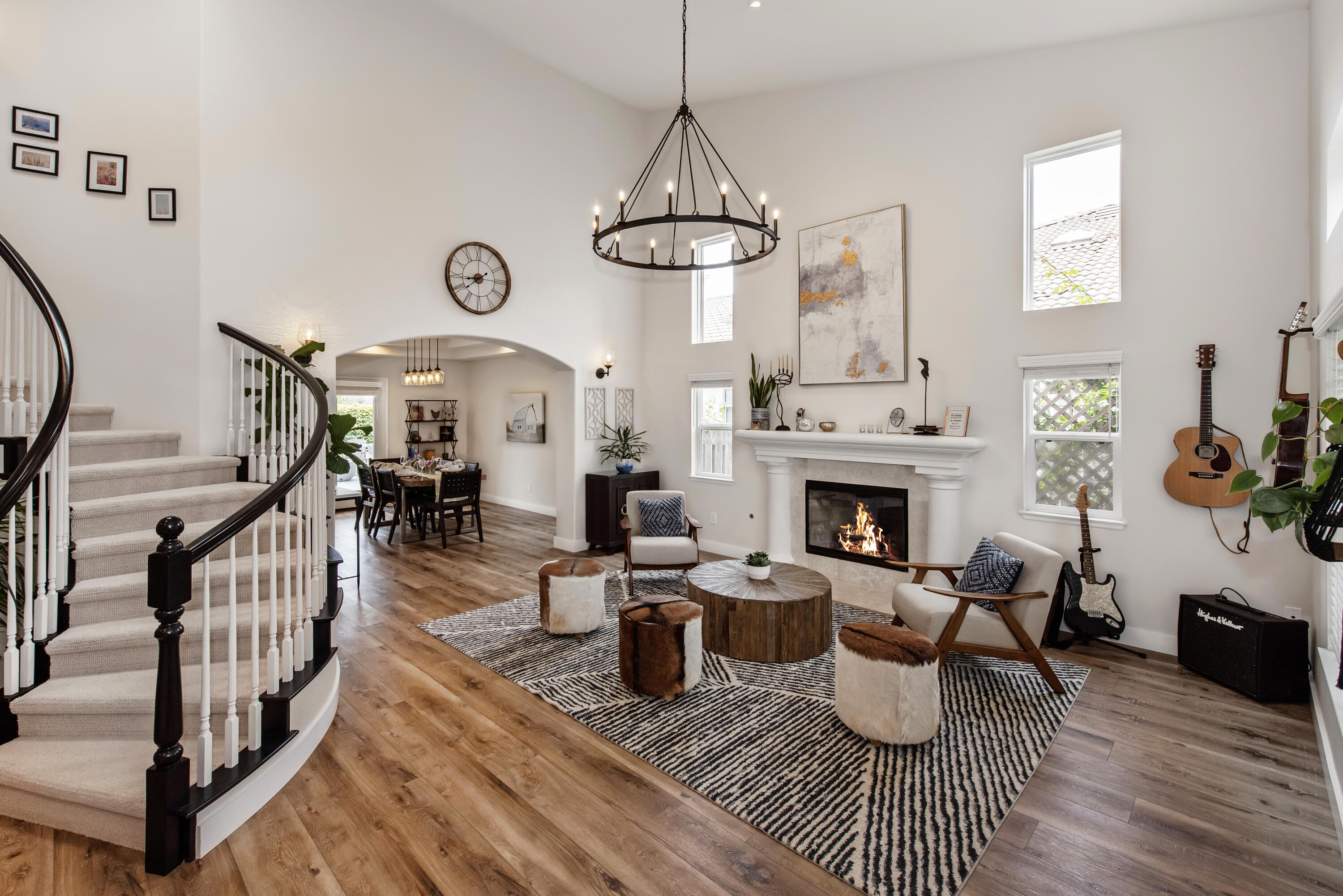 7906 Winchester Circle Goleta, CA 93117 - Photo 4 of 26 a living room with furniture a fireplace and white walls