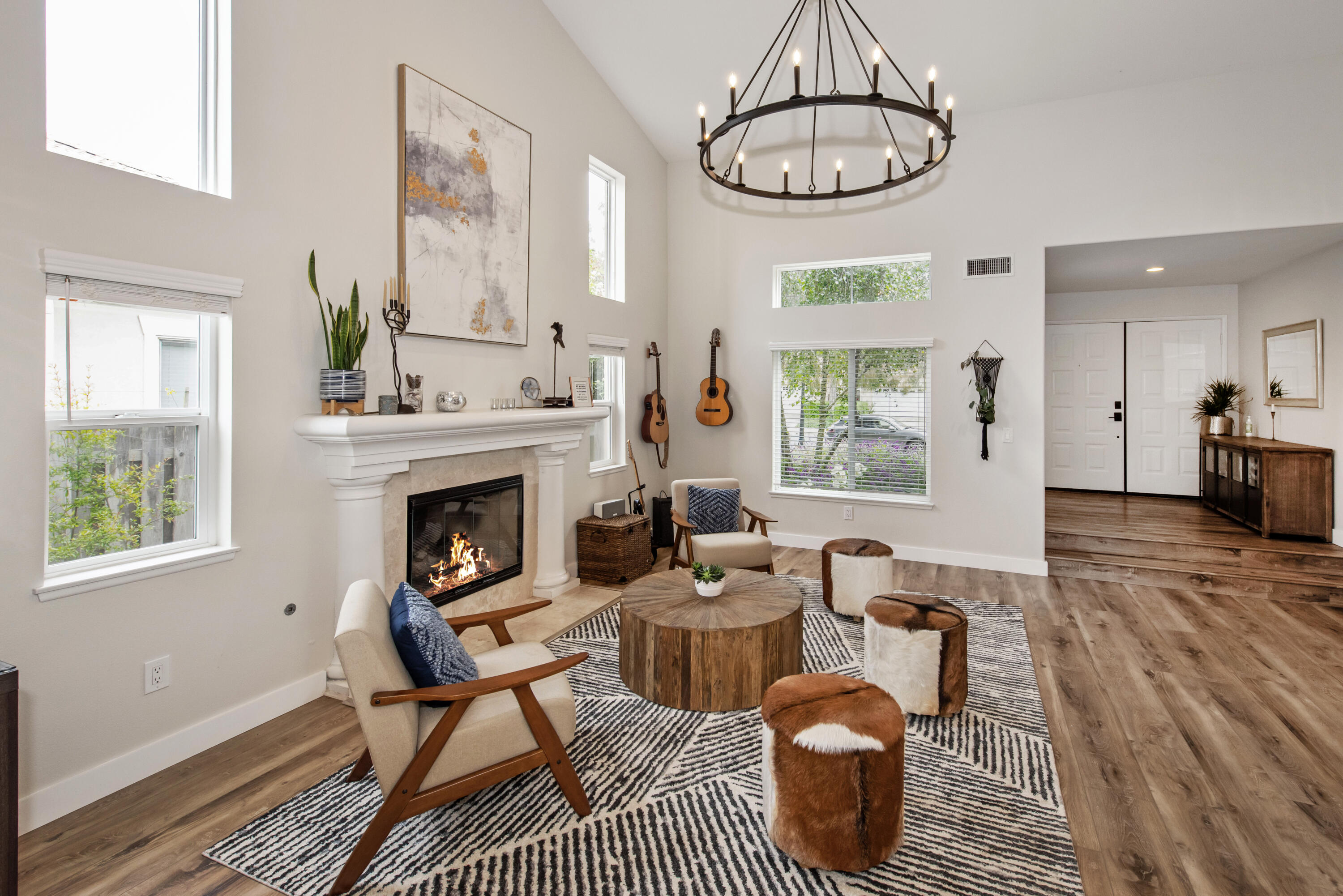 7906 Winchester Circle Goleta, CA 93117 - Photo 5 of 26 a living room with furniture a window and a fireplace