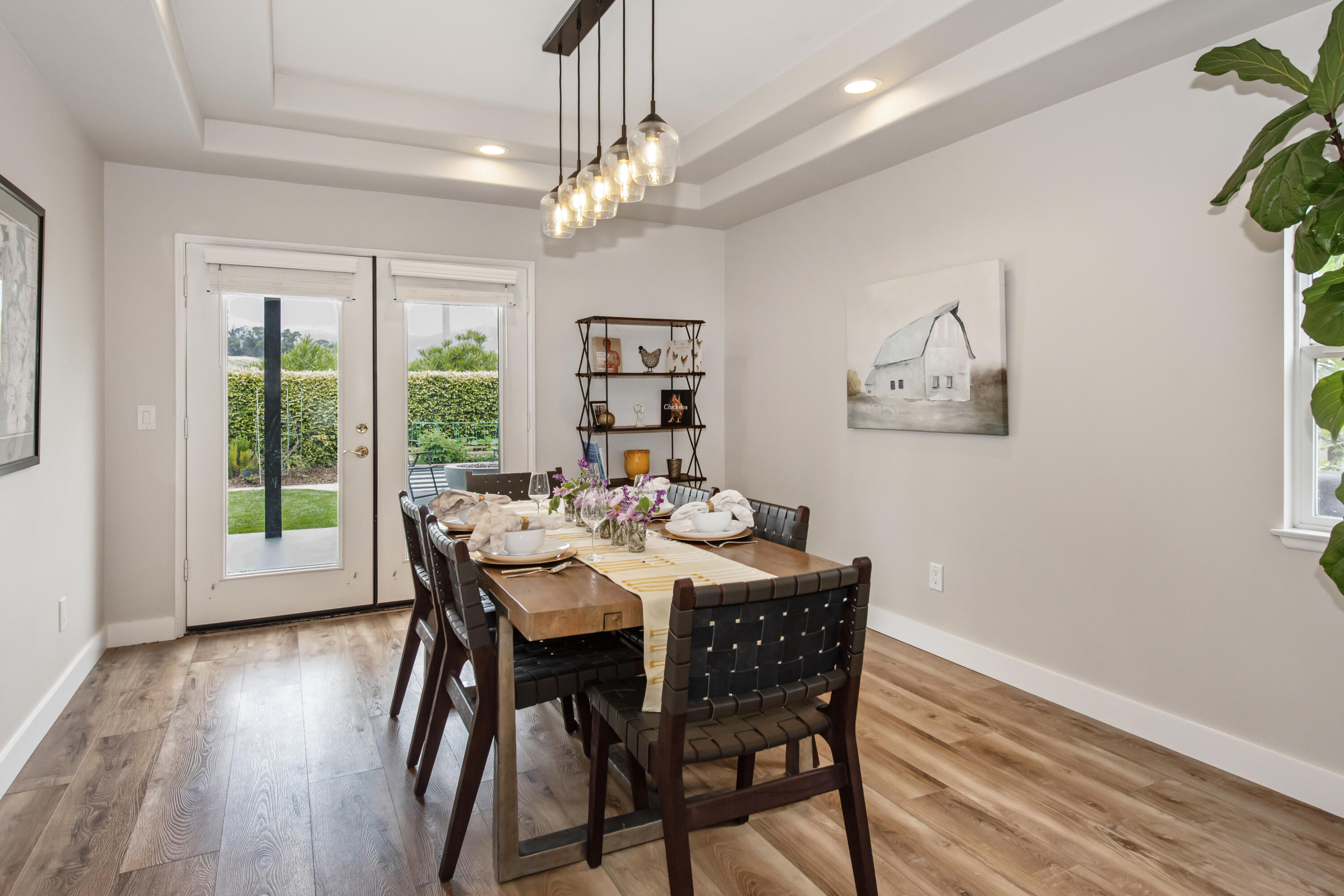 7906 Winchester Circle Goleta, CA 93117 - Photo 6 of 26 a view of a dining room with furniture window and wooden floor