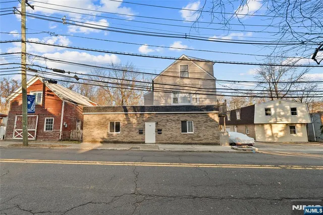 a view of a building with a street