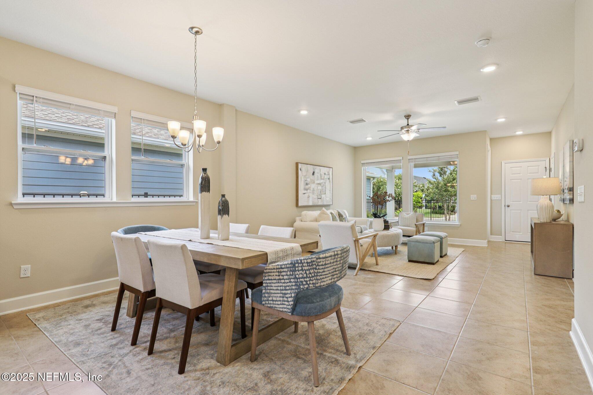 48 Gilchrist Way St. Augustine, FL 32092 - Photo 14 of 50 a view of a dining room with furniture window and outside view