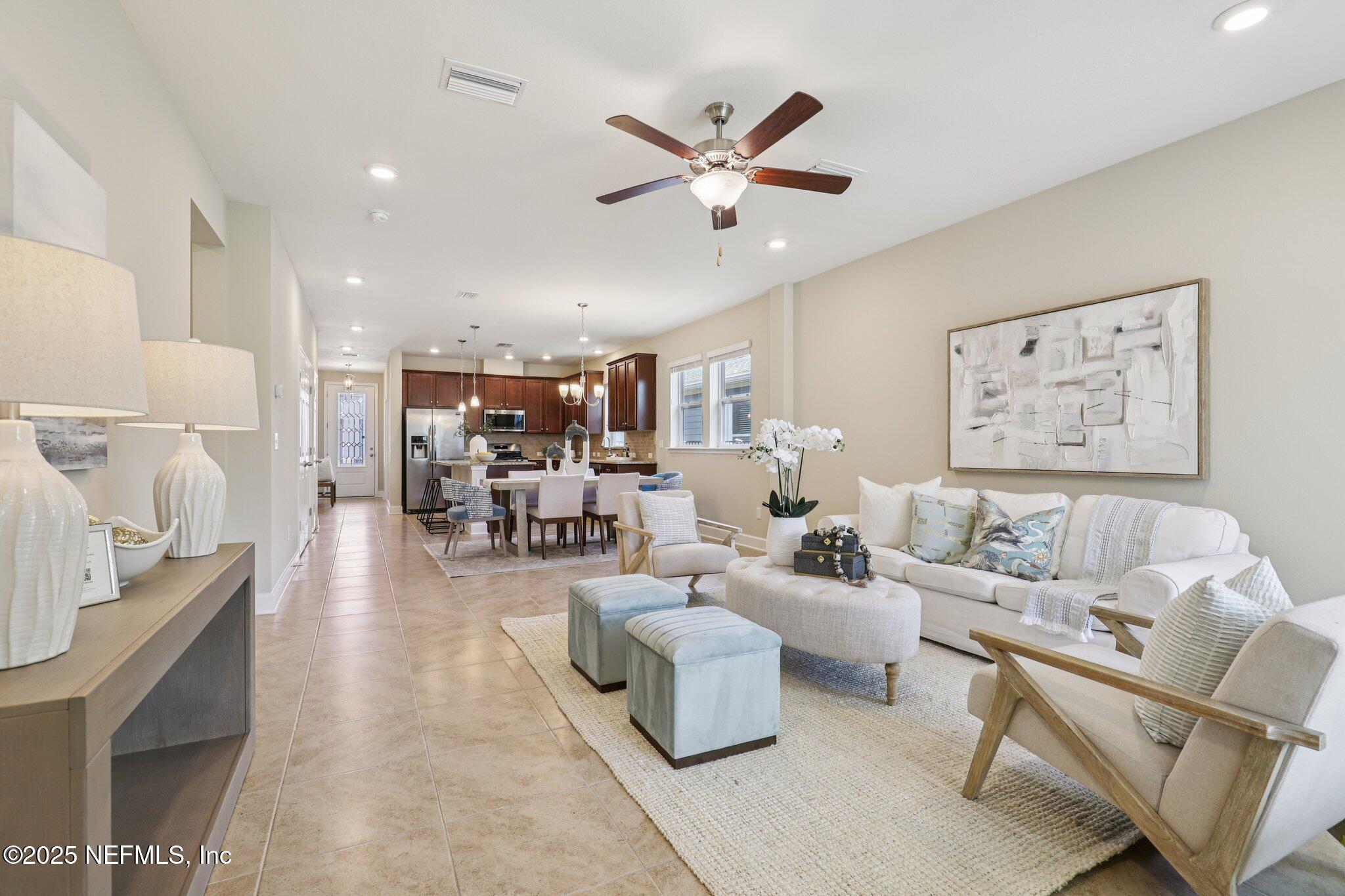 48 Gilchrist Way St. Augustine, FL 32092 - Photo 17 of 50 a living room with furniture and view of kitchen