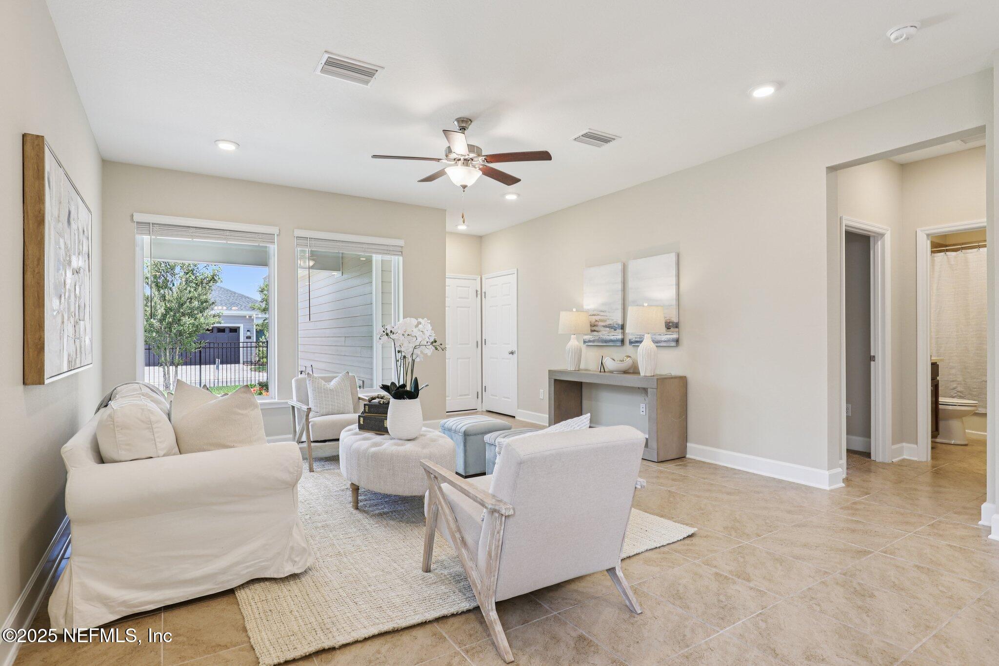 48 Gilchrist Way St. Augustine, FL 32092 - Photo 18 of 50 a living room with furniture and a large window