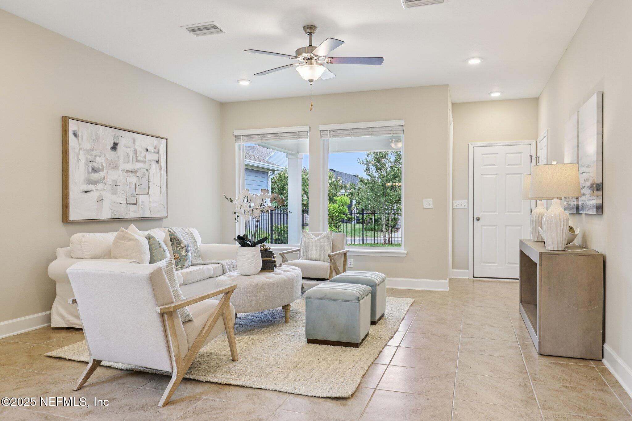 48 Gilchrist Way St. Augustine, FL 32092 - Photo 19 of 50 a living room with furniture and a large window