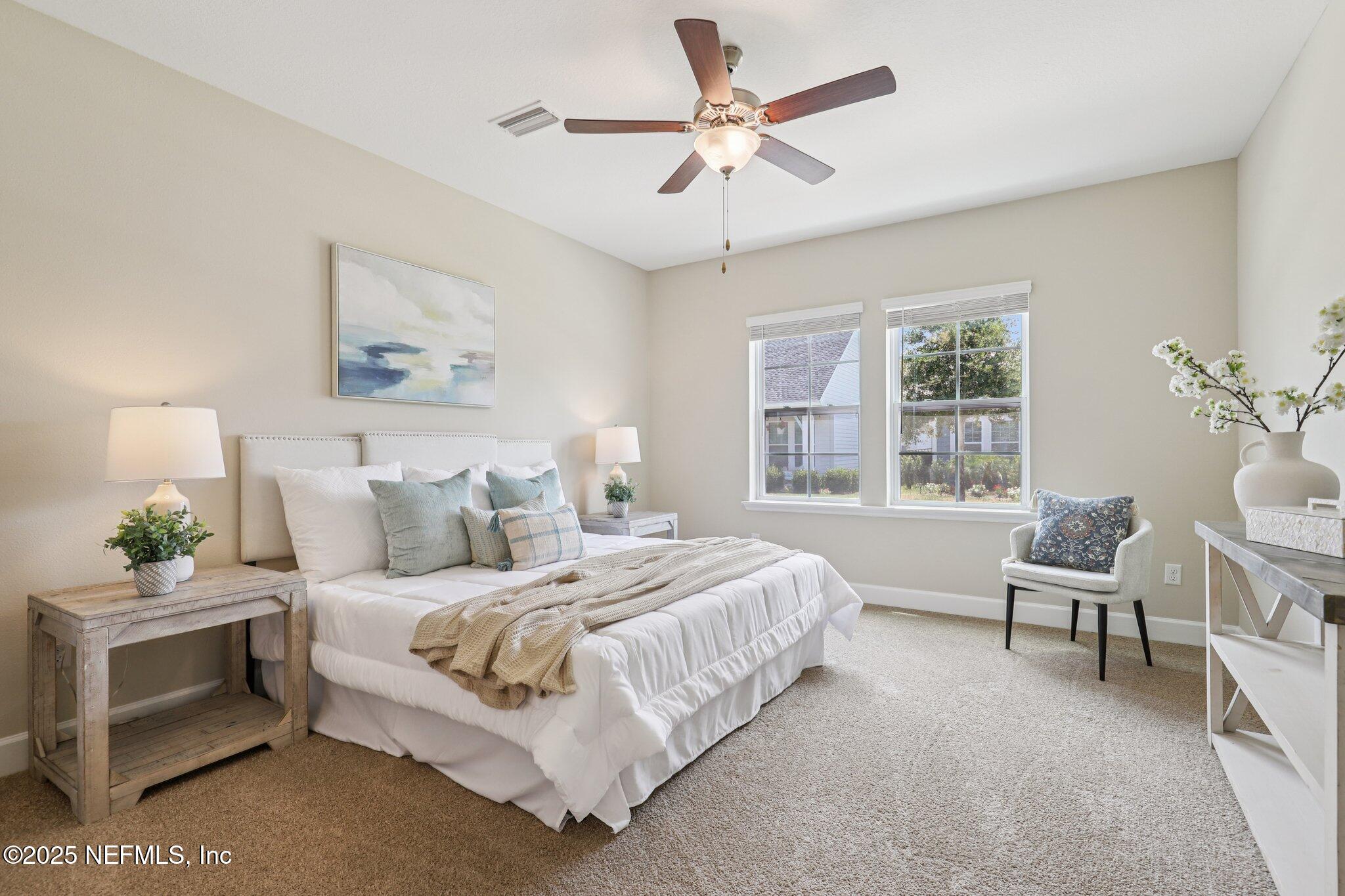 48 Gilchrist Way St. Augustine, FL 32092 - Photo 20 of 50 a bedroom with a bed and a window