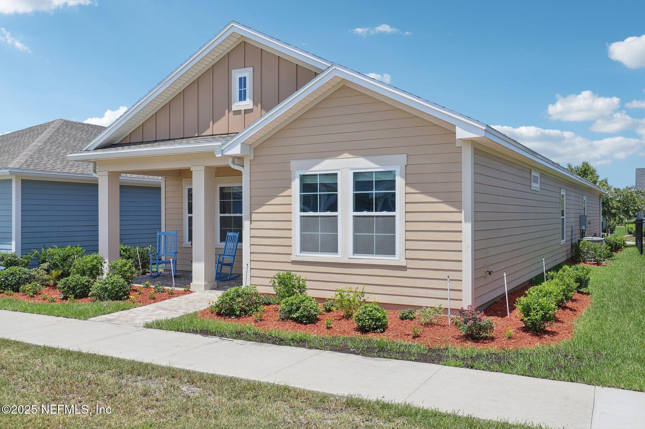 48 Gilchrist Way St. Augustine, FL 32092 - Photo 3 of 50 a front view of a house with a yard