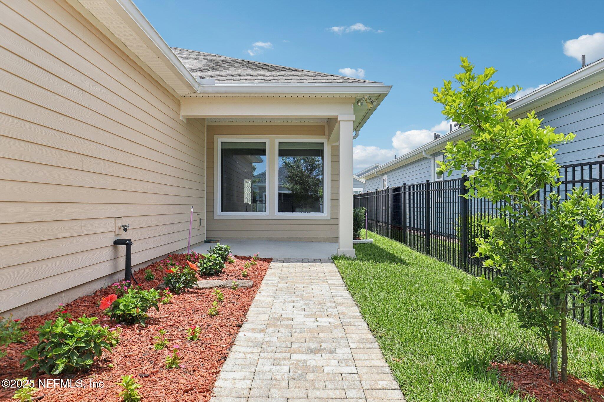 48 Gilchrist Way St. Augustine, FL 32092 - Photo 32 of 50 a view of a house with a yard