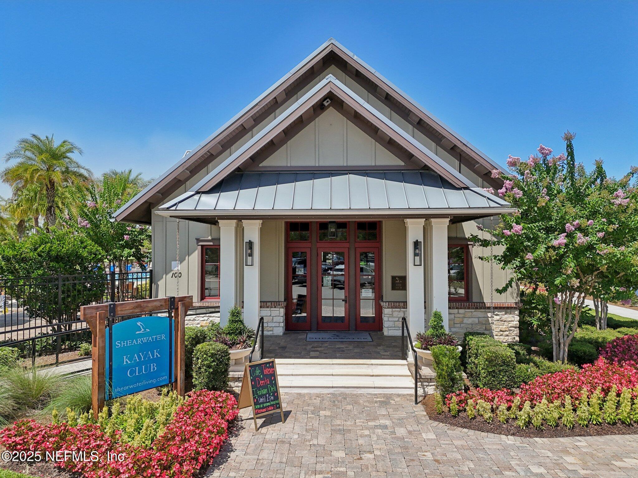 48 Gilchrist Way St. Augustine, FL 32092 - Photo 39 of 50 a front view of a house with a garden